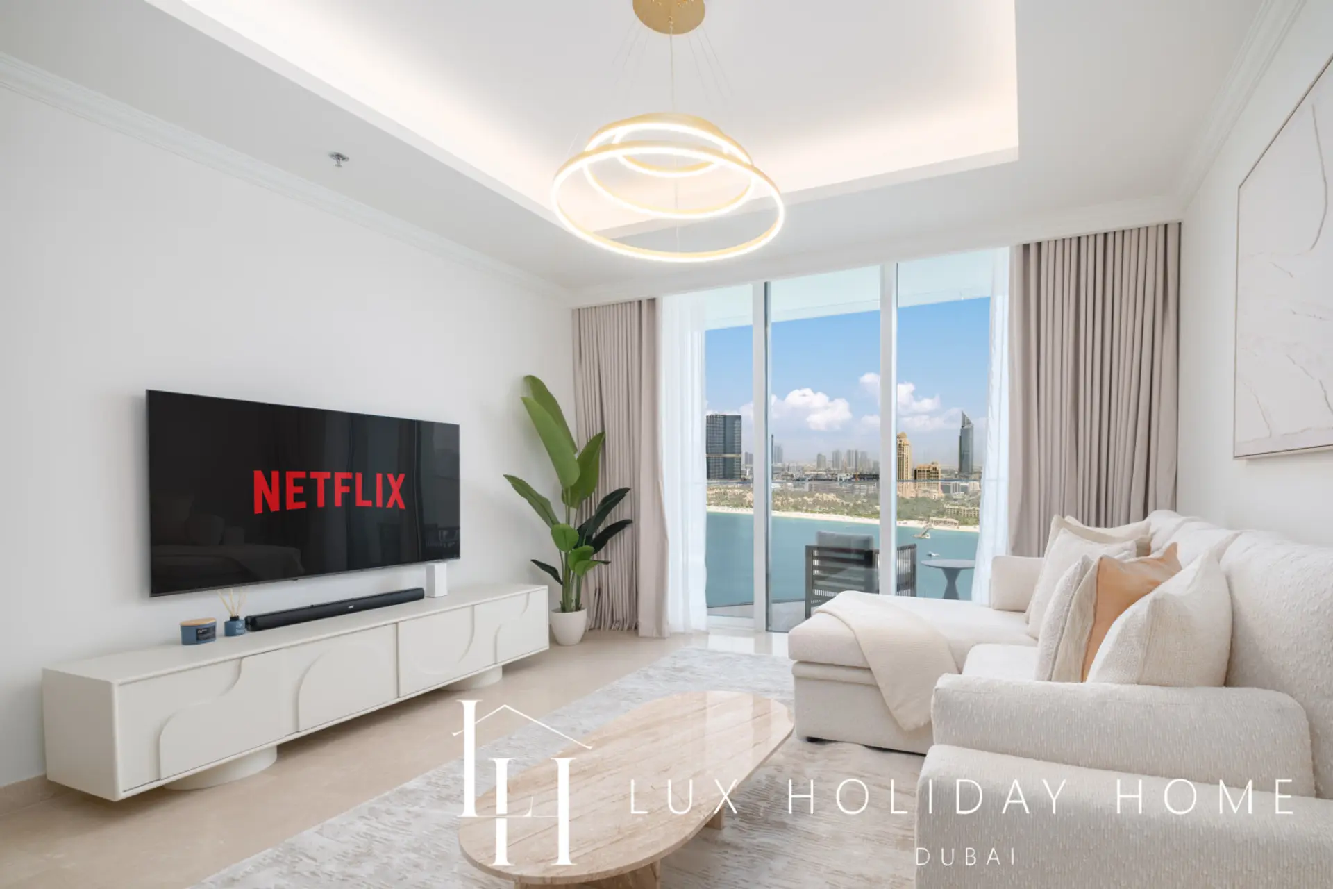 Living room overlooking Dubai Harbour at the Palace Residence Suite 2