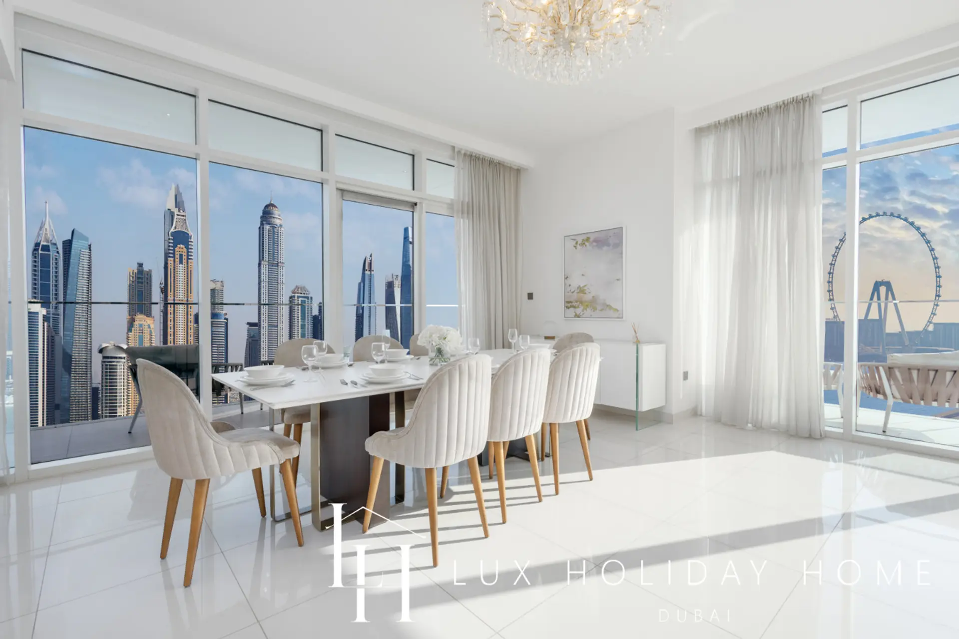 Dining area with floor-to-ceiling Marina views at the Palm Sea Skyline Penthouse, Dubai