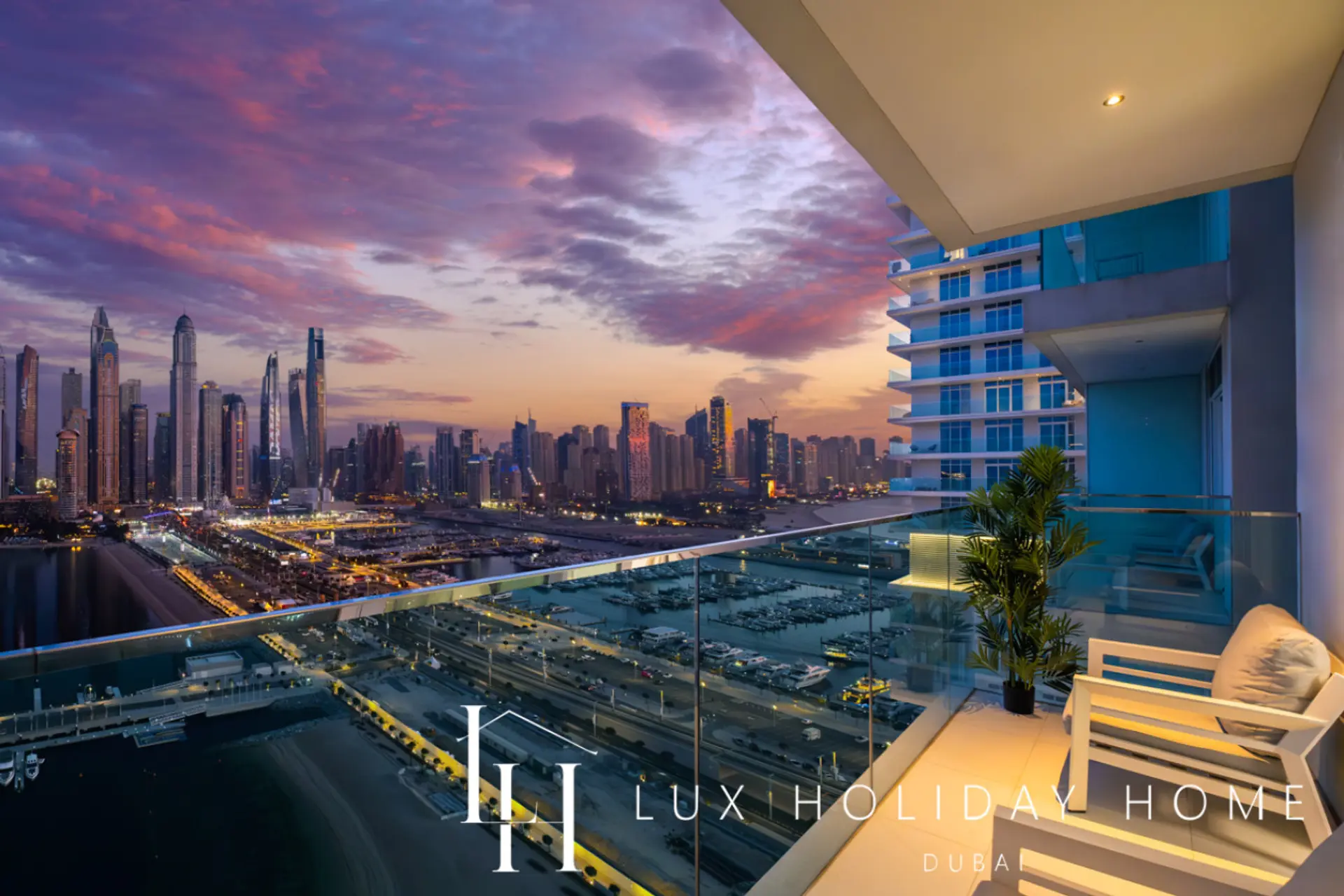 Sunset view of the Dubai Marina skyline from the balcony of LUX Sunrise Beachfront Suite 2