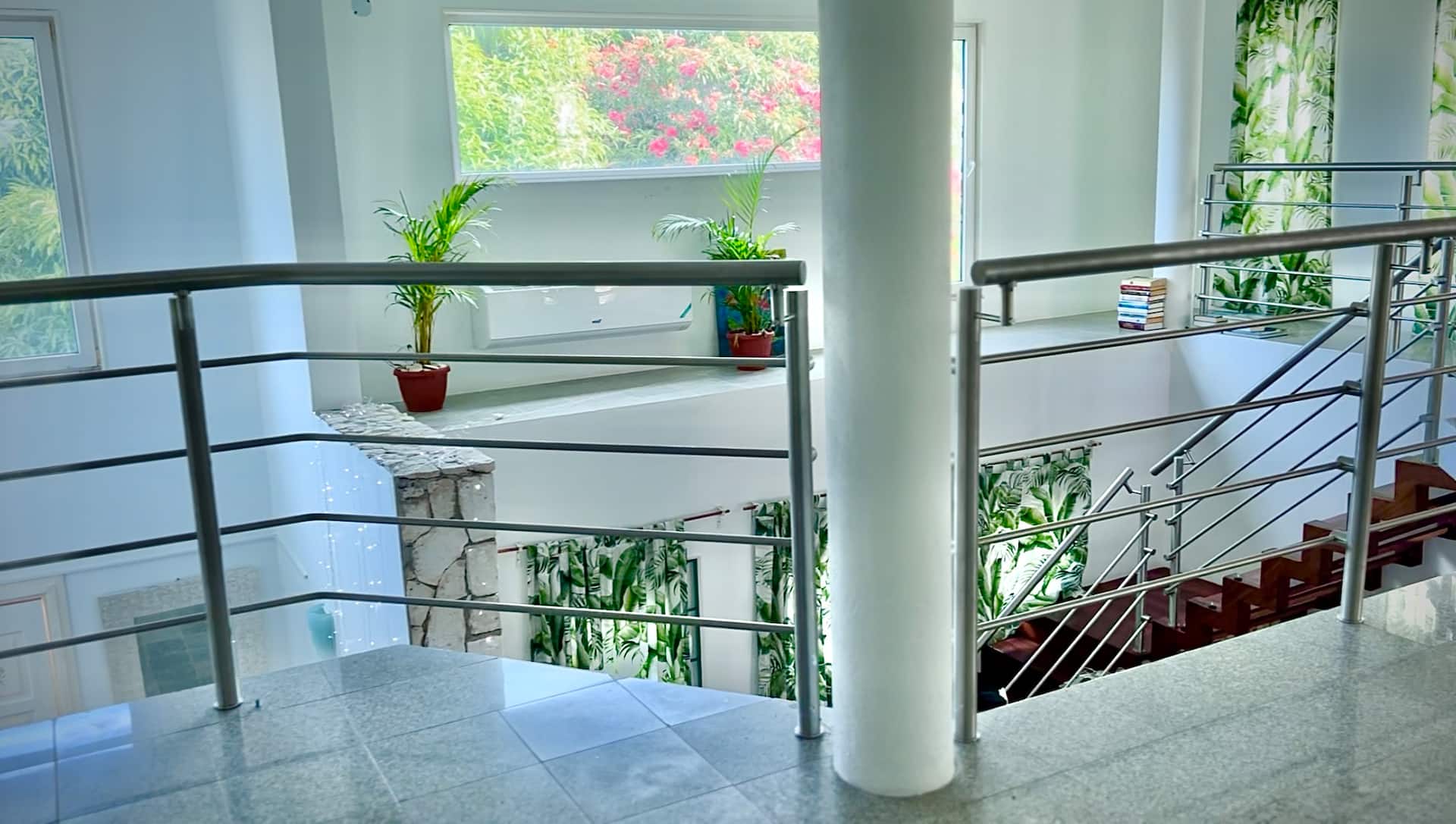 Interior stairwell and landing at Whispering Clouds Beach House, Jamaica